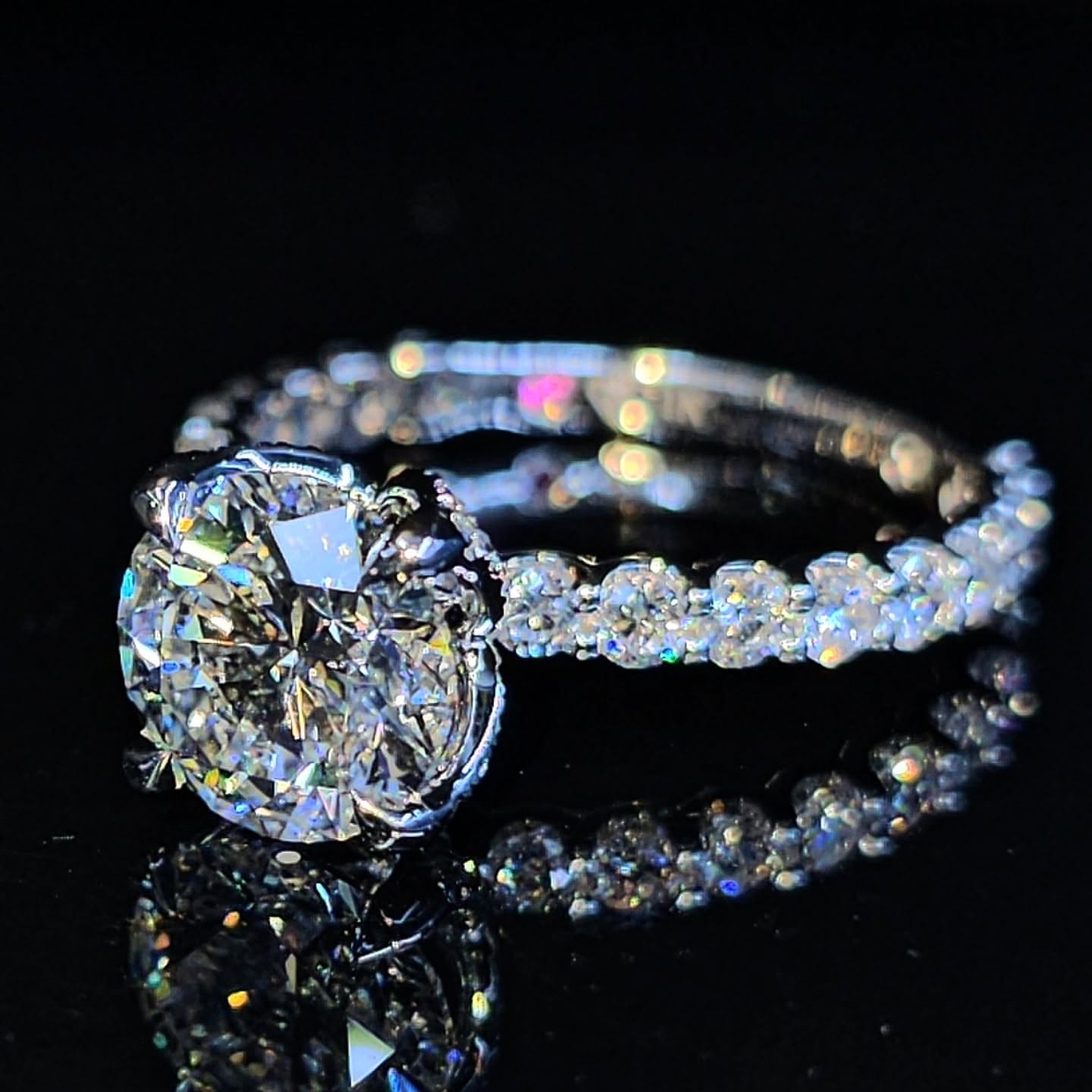 Round halo diamond solitaire engagement ring in white gold