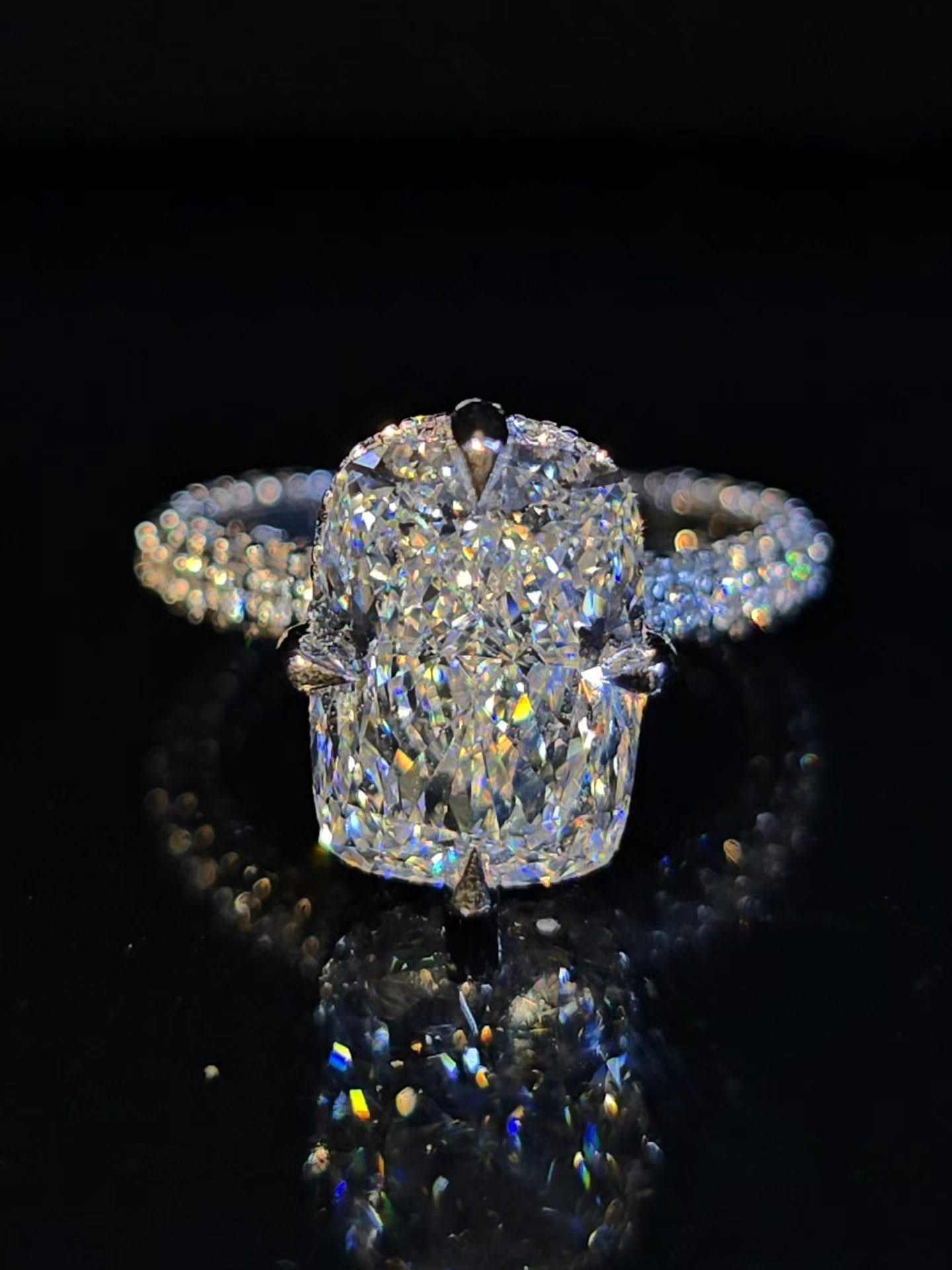Cushion cut diamond solitaire with hidden halo